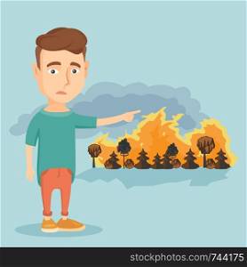 Frustrated man standing on the background of a big forest fire. Young caucasian man pointing at forest in fire. Concept of environmental destruction. Vector flat design illustration. Square layout.. Man standing on the background of wildfire.
