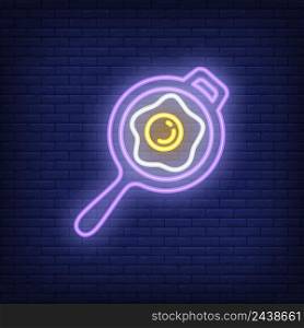 Frying pan with egg neon sign. Breakfast, morning concept. Advertisement design. Night bright neon sign, colorful billboard, light banner. Vector illustration in neon style.
