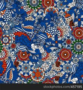 Full frame background made from floral designs and geometric patterns colored blue red green and brown. Full frame background made from floral designs