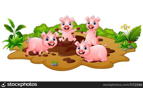 Funny pigs playing in the mud