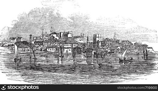 Gallipoli or Gelibolu in Turkey, during the 1890s, vintage engraving. Old engraved illustration of Gallipoli with moving boats in front and city in back.