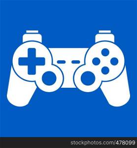 Game controller icon white isolated on blue background vector illustration. Game controller icon white