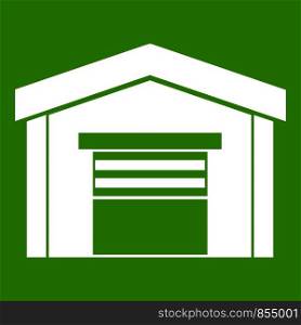 Garage icon white isolated on green background. Vector illustration. Garage icon green