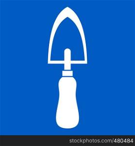 Garden trowel icon white isolated on blue background vector illustration. Garden trowel icon white