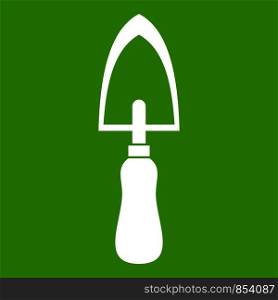 Garden trowel icon white isolated on green background. Vector illustration. Garden trowel icon green