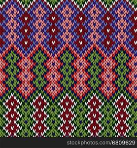 Geometrical ornate knitted seamless vector pattern as a fabric texture in various colors