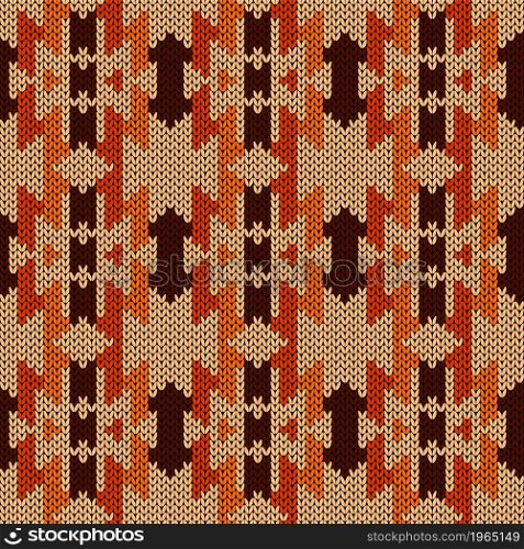 Geometrical ornate seamless knitted vector pattern as a fabric texture in orange and brown colors