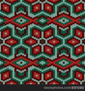 Geometrical ornate seamless knitted vector pattern as a fabric texture in red and green colors
