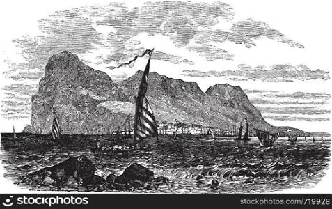 Gibraltar in Iberian Peninsula, Europe, during the 1890s, vintage engraving. Old engraved illustration of Gibraltar with moving boats in front.