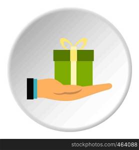 Gift box in hand icon in flat circle isolated vector illustration for web. Gift box in hand icon circle