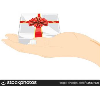 Gift in hand. Hand of the person with gift on white background is insulated