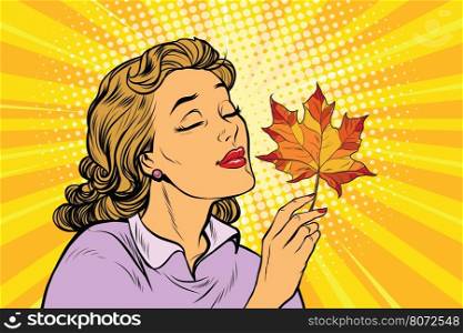 Girl and autumn, a woman with red maple leaf. pop art retro vector illustration. The seasons of nature