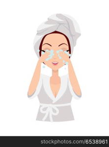 Girl Cleaning and Care Her Face. Girl cleaning and care her face, facial, treatment, beauty, healthy, hygiene, lifestyle. Young woman after morning shower in a bathroom. Skin care. Girl in white bathrobe and towel on head