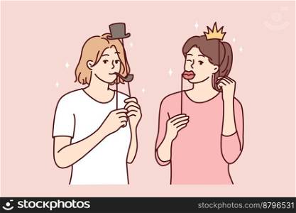 Girl friends with funny masks for photo shoot during house party or holiday carnival. Young casual women put cardboard lips and smoking pipe or crown with hat on their face. Flat vector illustration . Girl friends with funny masks for photo shoot during house party or holiday carnival. Vector image