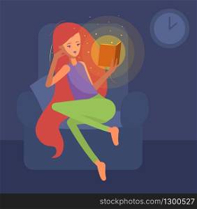 Girl with red hair reading a magic book at night.. Girl with red hair reading a magic book