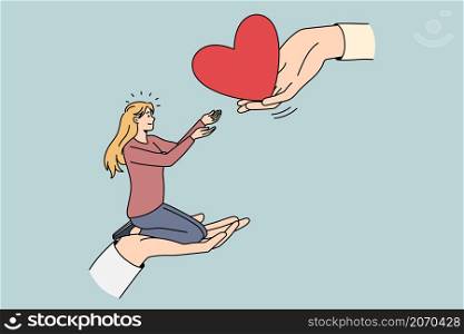Giving and taking love concept. Young smiling blonde woman sitting on huge hand and taking big red heart from another human hand vector illustration . Giving and taking love concept.
