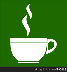 Glass cup of tea icon white isolated on green background. Vector illustration. Glass cup of tea icon green