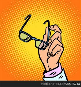 glasses in hand, vision and people. Comic book cartoon pop art retro vector illustration drawing. glasses in hand, vision and people