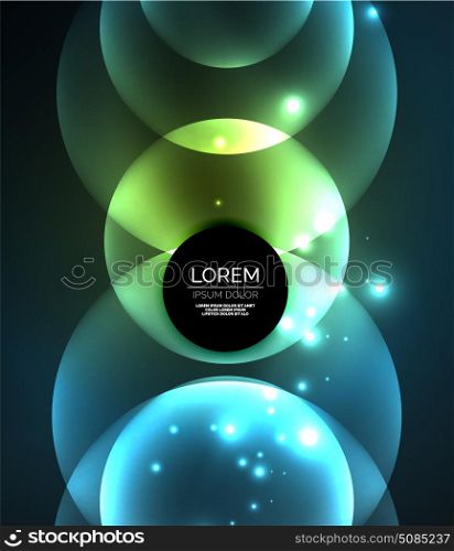 Glowing shiny overlapping circles composition on dark background. Glowing blue shiny overlapping circles composition on dark background, magic style light effects abstract design template