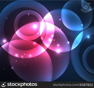 Glowing shiny overlapping circles composition on dark background. Glowing blue and purple colors shiny overlapping circles composition on dark background, magic style light effects abstract design template