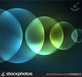 Glowing shiny overlapping circles composition on dark background. Glowing blue shiny overlapping circles composition on dark background, magic style light effects abstract design template