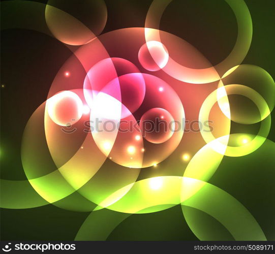 Glowing shiny overlapping circles composition on dark background. Glowing red and green color shiny overlapping circles composition on dark background, magic style light effects abstract design template