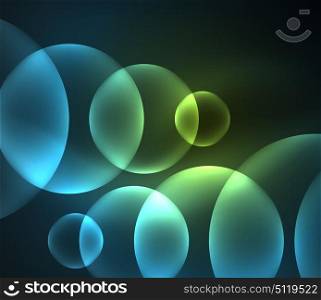 Glowing shiny overlapping circles composition on dark background. Glowing blue shiny overlapping circles composition on dark background, magic style light effects abstract design template