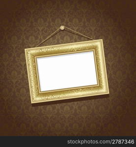 Gold frame on the wall with brown wallpaper