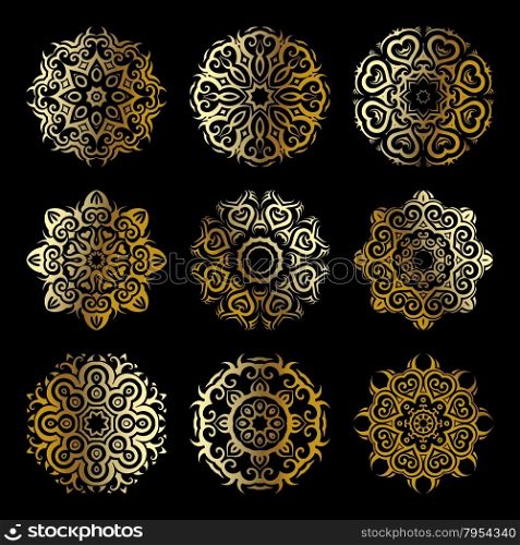 Gold mandala set. Gold mandala on black background. Ethnic vintage pattern collection.