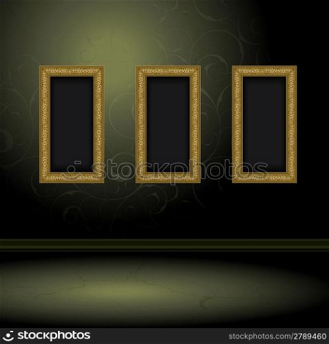 Gold three frames on the wall with green wallpaper