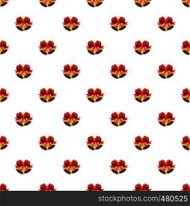 Golden Christmas bells with red bow pattern seamless repeat in cartoon style vector illustration. Christmas bells with red bow pattern