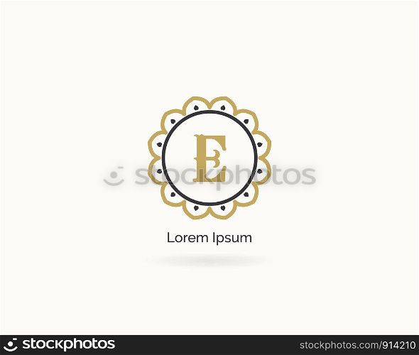 Golden E letter logo design. Luxury letter j monogram. Cosmetics and beauty product mandala illustration.