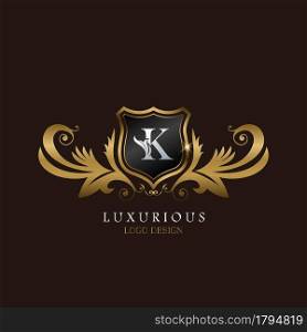 Golden K Logo Luxurious Shield, creative vector design for luxury brand identity.