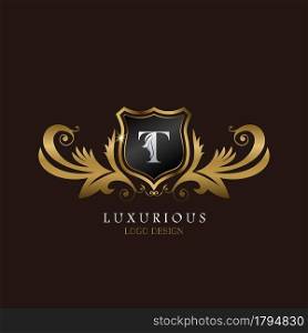 Golden T Logo Luxurious Shield, creative vector design for luxury brand identity.