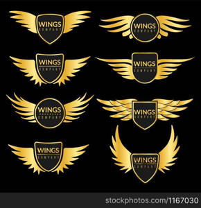 Golden wing set. Creative sport or business success awards with elegant eagle flying wings vector isolated luxurious symbols and metal logos. Golden wing set. Creative sport or business success awards with elegant eagle flying wings vector isolated metal logos