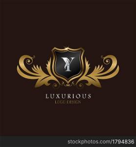 Golden Y Logo Luxurious Shield, creative vector design for luxury brand identity.