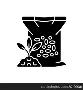 Granular fertilizer black glyph icon. Plants growth increasing. Grass and crops nourishment. Supplements, minerals for ground. Silhouette symbol on white space. Vector isolated illustration. Granular fertilizer black glyph icon