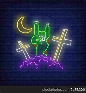 Graveyard with devil horn zombie hand gesture neon sign. Halloween, monster, horror design. Night bright neon sign, colorful billboard, light banner. Vector illustration in neon style.
