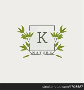 Green eco letters K logo with leaves in square shape. Initials with botanical elements with floral letter design for business identity
