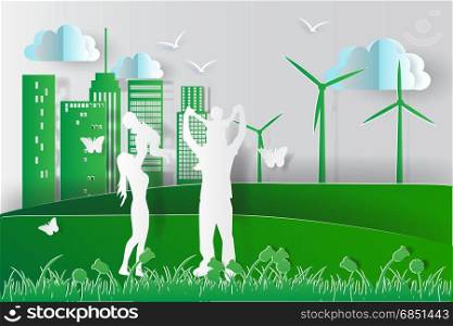 green environment happy family having fun playing in the field.paper cut style,vector