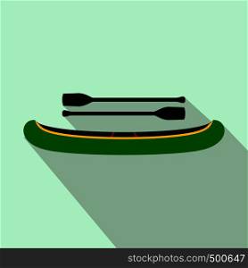 Green kayak with oars icon in flat style on a light blue background . Green kayak with oars icon, flat style