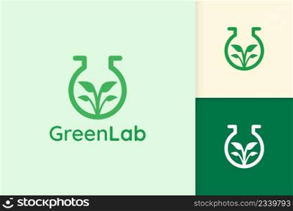 green lab logo with leaf shape for science or chemistry