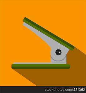 Green office hole punch icon. Flat illustration of green office hole punch vector icon for web isolated on yellow background. Green office hole punch icon, flat style