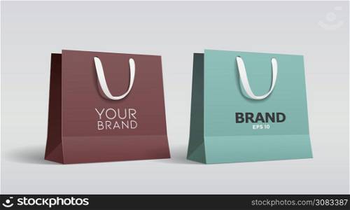 Green paper bag and Brown paper bag with white cloth handle design template, on gray background Eps 10 vector illustration