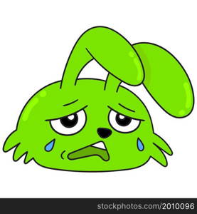 green rabbit head is sad crying tears