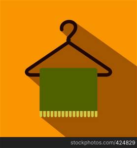 Green scarf on coat-hanger flat icon on a yellow background. Green scarf on coat-hanger flat icon