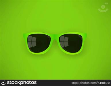 green sunglasses on a green background