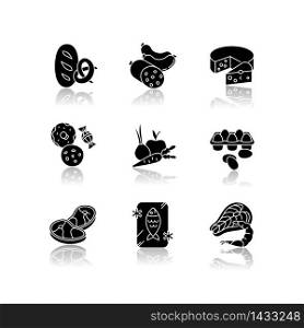 Grocery food drop shadow black glyph icons set. Bread loaf, fresh baked goods. Meat sausages. Candy and cookies. Fresh vegetables, organic fruits. Isolated vector illustrations on white space. Grocery food drop shadow black glyph icons set