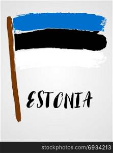 Grunge brush stroke with flag. Grunge brush stroke with Estonia national flag isolated on light grey background