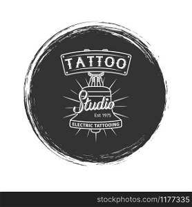 Grunge tattoo studio or salon logo, emblem, badge design, vector illustration. Grunge tattoo studio logo
